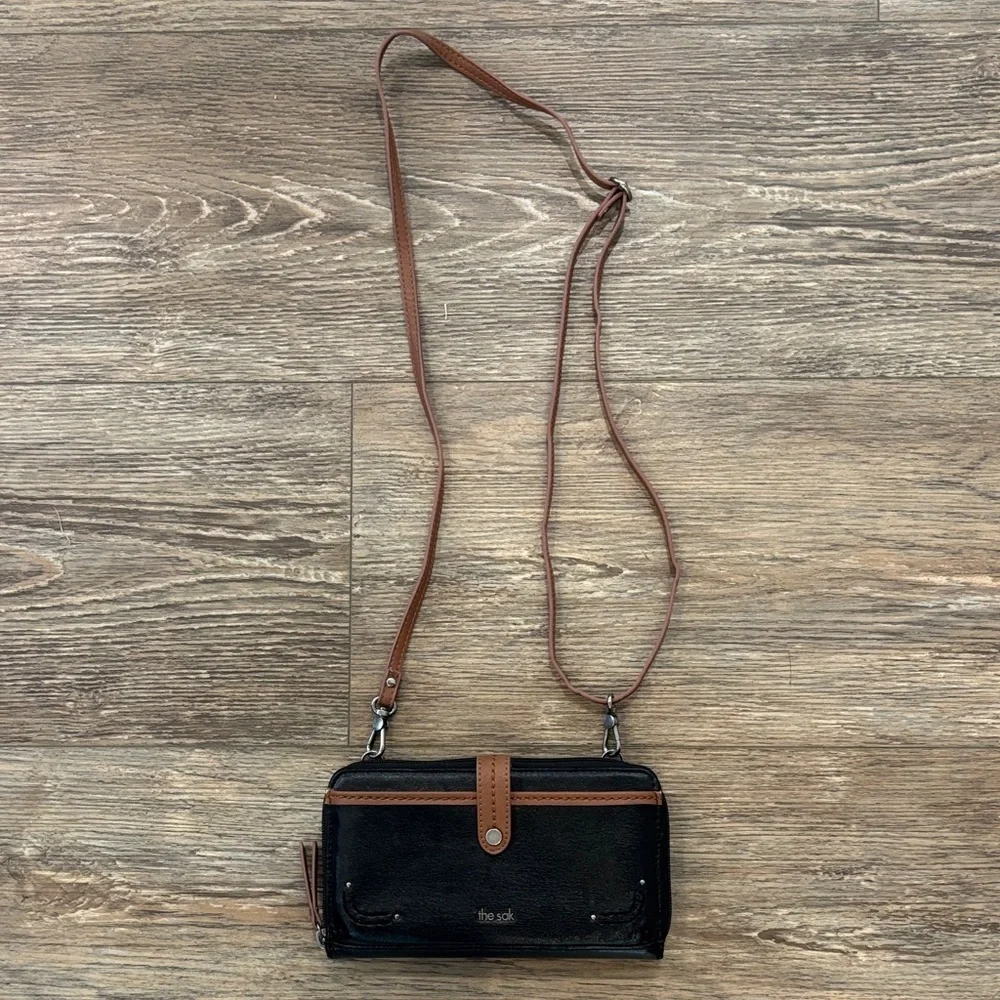 The Sak Large Smartphone Crossbody and Wristlet Leather Wallet Black and Brown